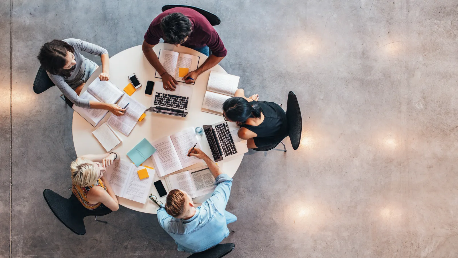 Students studying around a table