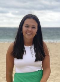 Picture of Gabby smiling on the beach